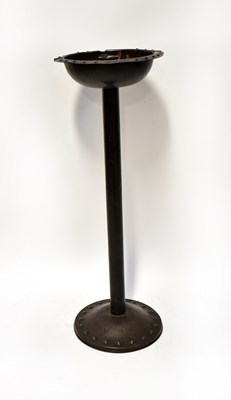 Lot 582 - An unusual metal smoker's stand with pressed...