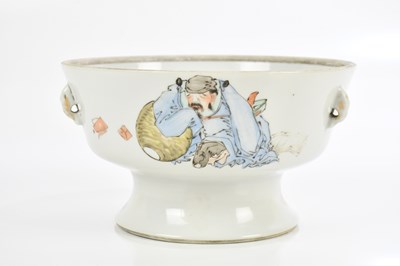 Lot 1057 - A Chinese Famille Rose footed bowl with lug...