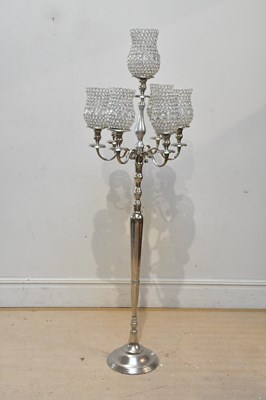 Lot 385 - A 20th century steel six branch standard lamp,...