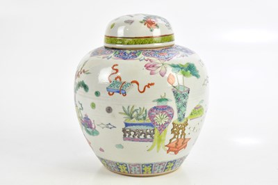 Lot 1034 - A 19th century Chinese Famille Rose ginger jar...