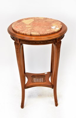 Lot 31 - A reproduction French marble-top circular...