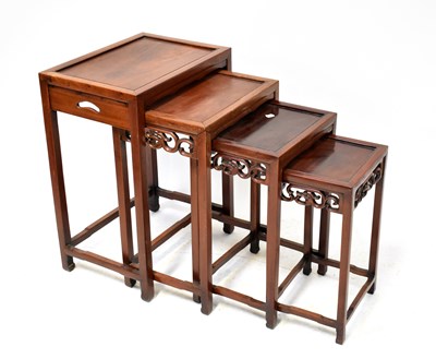 Lot 82 - A Chinese quartetto of tables with pierced...