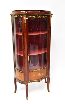 Lot 90 - A Louis XV style display cabinet, in mahogany...