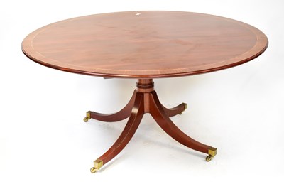 Lot 53 - A Georgian-style circular dining table, cross...