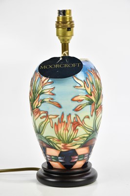 Lot 405 - MOORCROFT; an 'Indian Paintbrush' pattern lamp,...