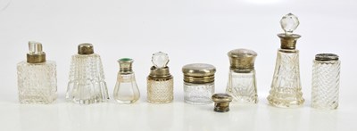 Lot 590 - A collection of eight cut glass hallmarked...