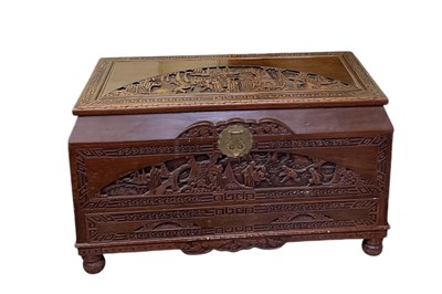 Lot 48 - A camphorwood chest, with carved top and sides...