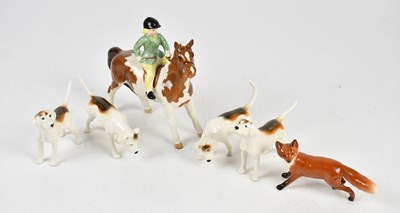 Lot 441 - BESWICK; a model of a girl on pony, Beswick...