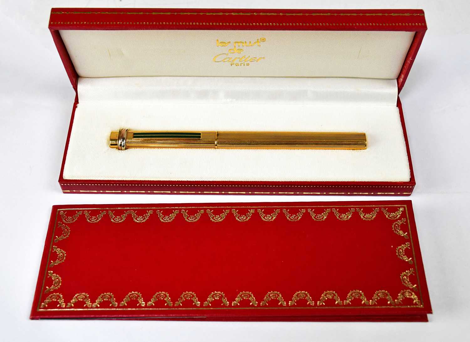 Lot 551 - MUST DE CARTIER; a ST10351 gold-plated pen