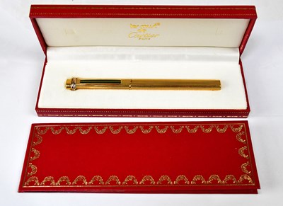 Lot 551 - MUST DE CARTIER; a ST10351 gold-plated pen...