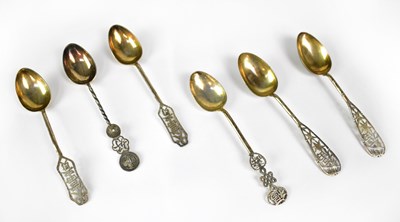 Lot 728 - A set of four Chinese white metal teaspoons,...