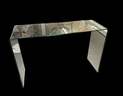 Lot 73 - A modern clear glass hall table, width 123cm,...