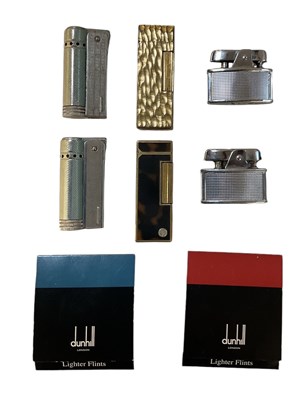 Lot 278 - Two Dunhill cigarette lighters, two stainless...