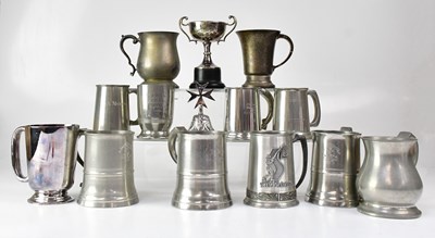 Lot 593 - A quantity of pewter tankards, to include a...