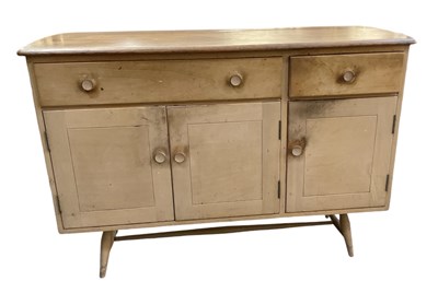 Lot 35 - ERCOL; a mid century light elm sideboard, with...