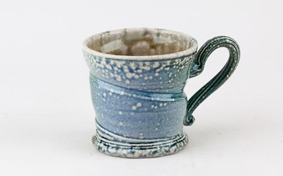 Lot 702 - WALTER KEELER (born 1942); a salt glazed mug,...