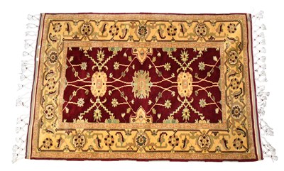 Lot 298 - A Turkish rug, with stylised floral and...