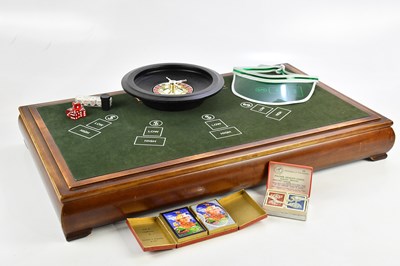 Lot 981 - A table top casino game board, including Black...