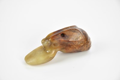 Lot 1103 - A Chinese hardstone netsuke, length 7cm.