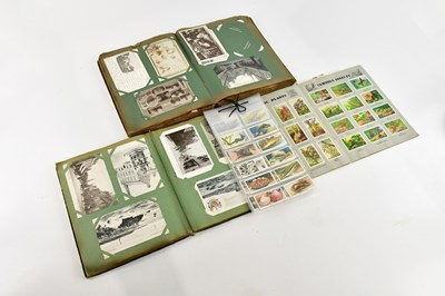 Lot 660 - PICTURE POSTCARDS; two vintage albums with...