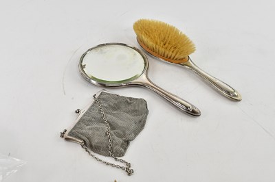 Lot 97 - A George V hallmarked silver mesh purse with...