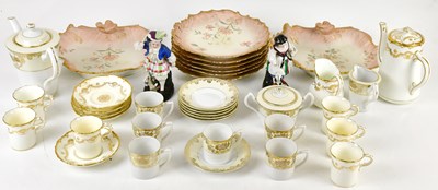 Lot 501 - LIMOGES; a decorative part dessert service in...