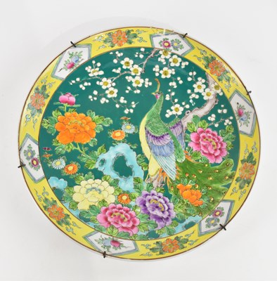 Lot 1104 - A Chinese Famille Verte wall charger,...