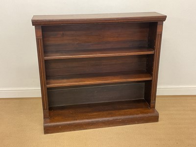 Lot 792 - An early 20th century oak bookcase with two...