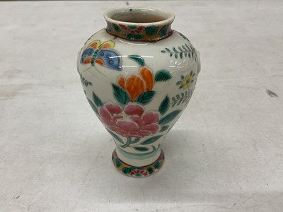 Lot 574 - A Chinese porcelain Famille Rose vase,...
