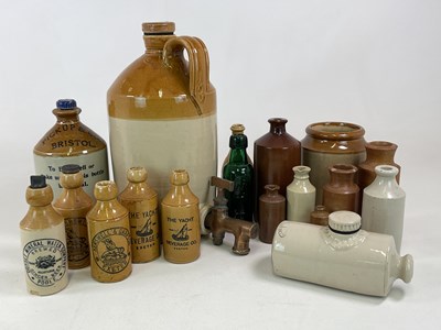 Lot 42 - A quantity of stoneware bottles and flagons,...