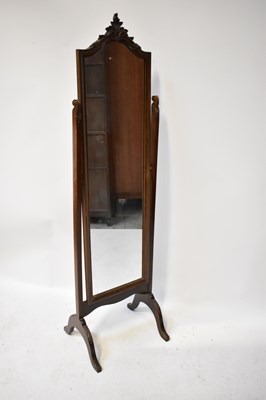 Lot 36 - An early 20th century oak framed cheval mirror,...