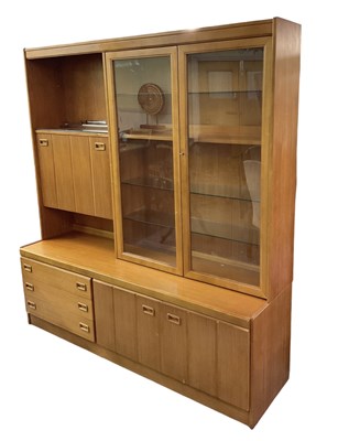 Lot 37 - A teak mid century wall unit, with pair of...