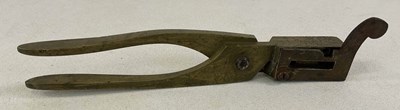 Lot 112 - A brass shot mould, length 24.5cm.