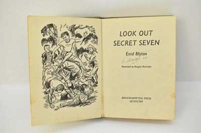 Lot 517 - ENID BLYTON; a signed copy of 'Look Out Secret...