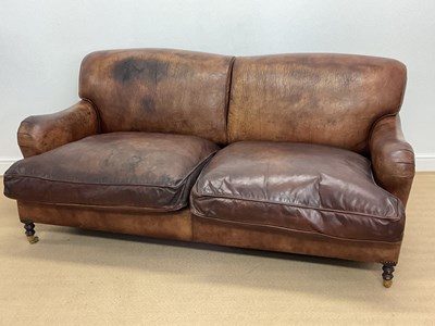 Lot 758 - GEORGE SMITH; a brown leather sofa raised on...