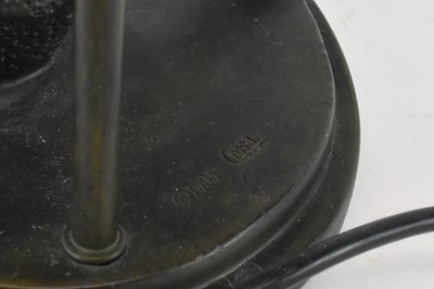 Lot 109 - An Art Deco style bronzed resin figural table...