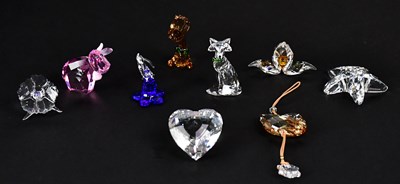 Lot 310 - SWAROVSKI; seven boxed glass ornaments...