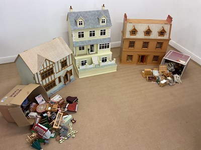 Lot 161 - Three large wooden doll's houses, largest 98 x...