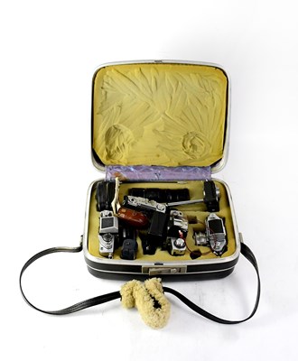 Lot 469 - A case containing cameras and accessories
