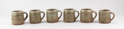 Lot 351 - JIM MALONE (born 1946); a set of six stoneware...