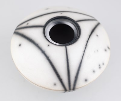 Lot 670 - TIM ANDREWS (born 1960); a raku jar and cover...
