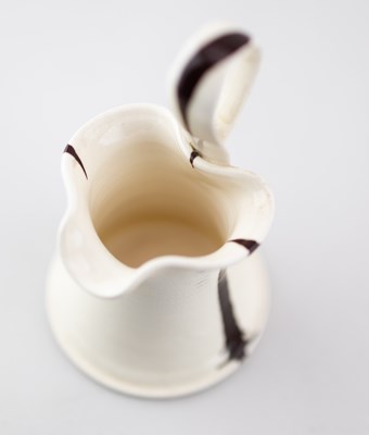 Lot 55 - JONNA BEHRENS (born 1946); an earthenware jug...