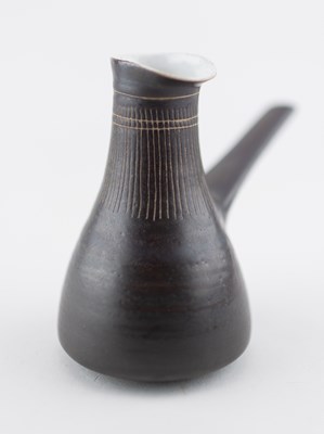 Lot 63 - LUCIE RIE (1902-1995); a stoneware milk jug...