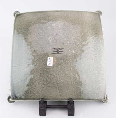 Lot 87 - POLLIE & GARRY UTTLEY; a square earthenware...