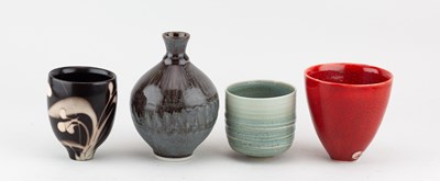 Lot 103 - TIM ANDREWS (born 1960); a raku cup covered in...