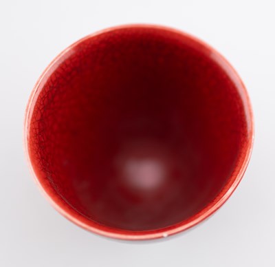 Lot 103 - TIM ANDREWS (born 1960); a raku cup covered in...