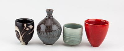 Lot 103 - TIM ANDREWS (born 1960); a raku cup covered in...