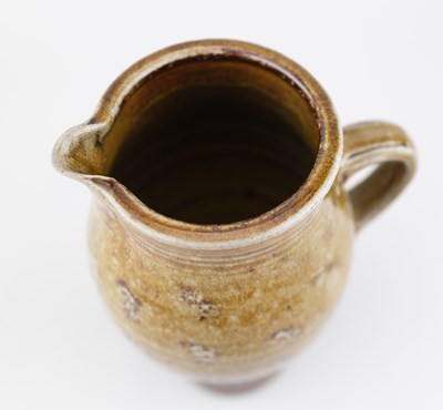 Lot 129 - MICHAEL CASSON (1925-2003); a salt glazed jug...