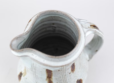 Lot 130 - MIKE DODD (born 1943); a stoneware jug covered...