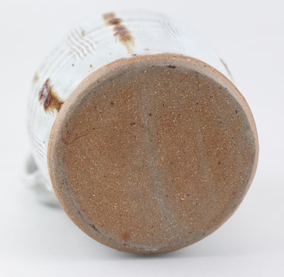 Lot 130 - MIKE DODD (born 1943); a stoneware jug covered...